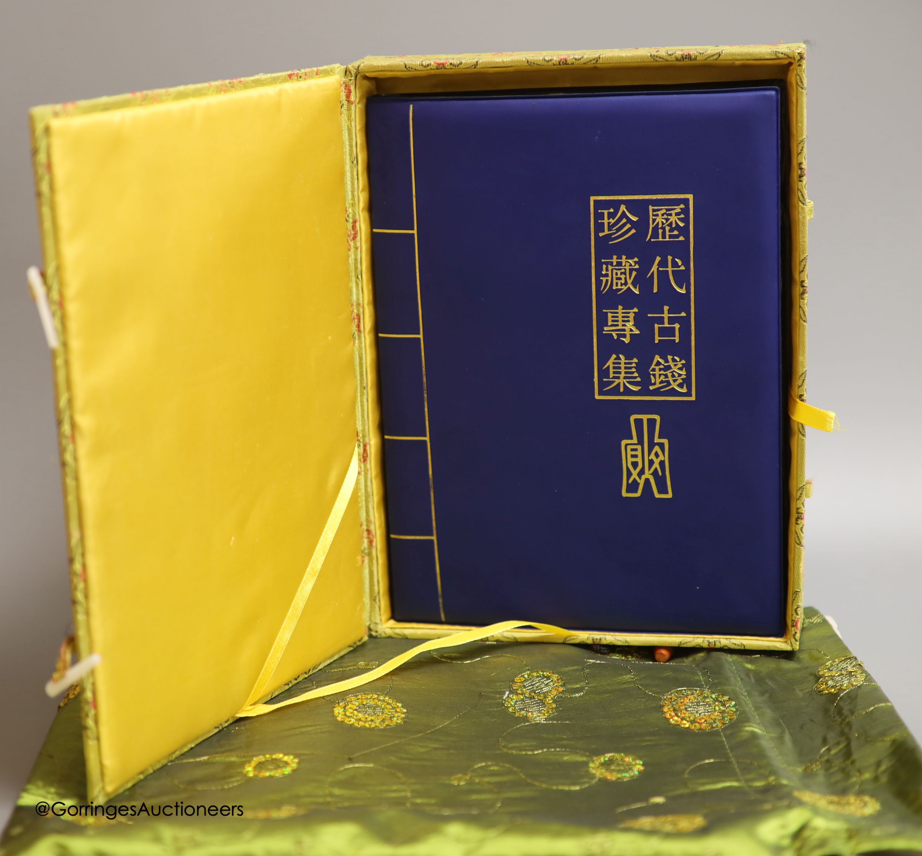 A collection of Chinese coins, cowrie shell currency and banknotes, Shang dynasty to PRC period